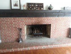 Potential for huge fireplace insert or stove, but is flue an issue? Need advice