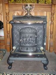 Antique Glenwood parlor stove