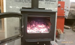 EPA vs non EPA wood stove in shop