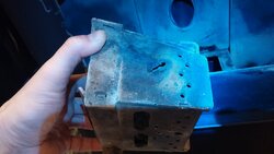 Side of burn pot melted, now has hole in it