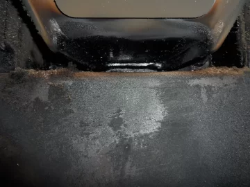 [Hearth.com] Fire behind the burn pot of a Harman Accentra FS...