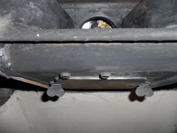 [Hearth.com] Fire behind the burn pot of a Harman Accentra FS...