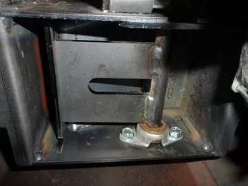 [Hearth.com] Fire behind the burn pot of a Harman Accentra FS...