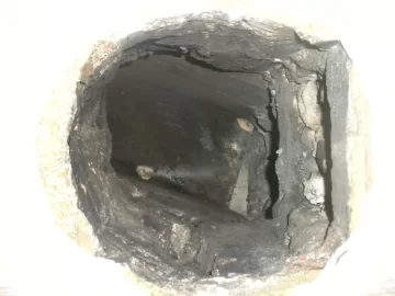 [Hearth.com] Basement flue with no bottom clean out?