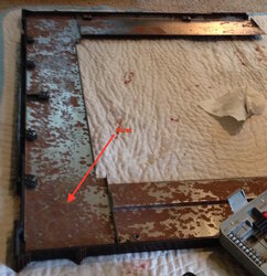 Rust inside the frame of Mt. Vernon pellet insert AE