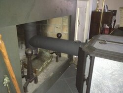 Idea for making custom reflector for fireplace opening behind free-standing woodstove