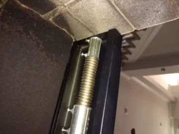 [Hearth.com] Plastic Piece/Spring on top of Fireplace???