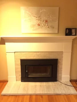 [Hearth.com] How far can a fireplace insert stick out?