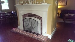 Any heat benefit to steel doors on standard fireplace?