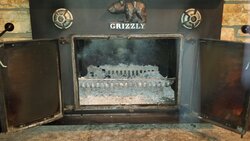 What is this thing in my fireplace? (pictures)