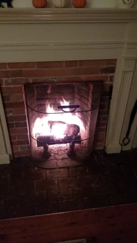 [Hearth.com] Open fireplace burning