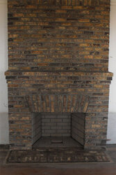 rebuilt-fireplace-custom-brick-mantel.jpg