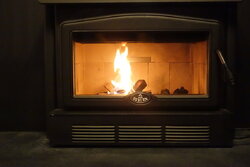 How far can a fireplace insert stick out?