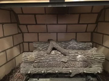 [Hearth.com] Can I convert my gas log fireplace to wood burning?