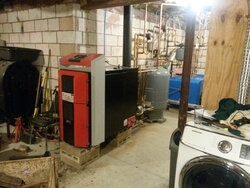 Installing Wood Gassification Boiler With 1000 Gallon Thermal Storage