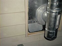 Can someone explain the wall thimble that combines the hole for fresh air intake?