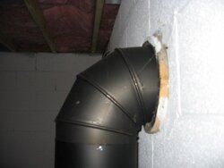 How to safely install basement insulation around stove pipe