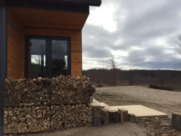 [Hearth.com] who piles up wood on there front porch?