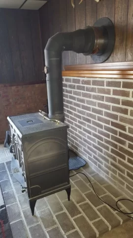 [Hearth.com] New Chimney Melting My Vinyl Siding