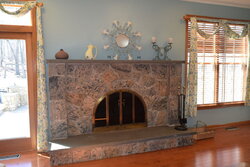 Is it possible to get an insert into this arched fireplace?