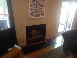 Advice on replacing Sheetmetal fireplace with Wood Stove