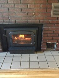 Custom surround for insert set into fireplace