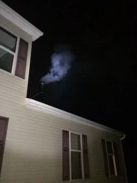 [Hearth.com] Grandma bear smoking into the house...