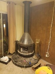 Can I replace my fireplace with a wood stove?