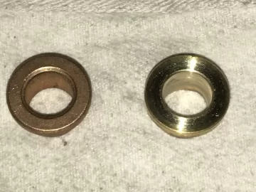 [Hearth.com] Newer Breckwell lower auger bushing VS. old bronze Bushing