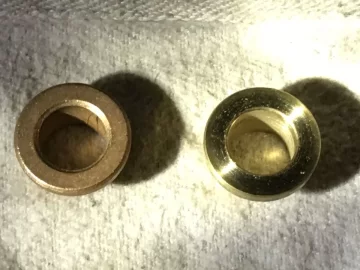 [Hearth.com] Newer Breckwell lower auger bushing VS. old bronze Bushing