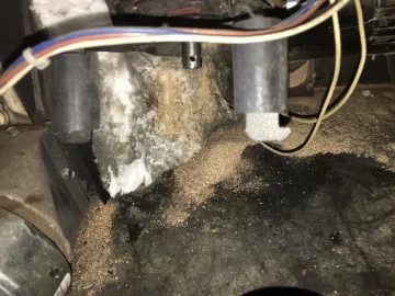 [Hearth.com] Newer Breckwell lower auger bushing VS. old bronze Bushing