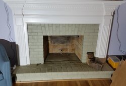 Freestanding stove install venting through masonry fireplace.