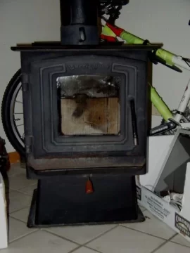 [Hearth.com] Old Stove-wooden thimble clearance?
