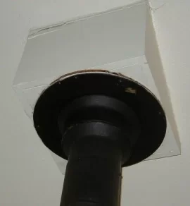 [Hearth.com] Old Stove-wooden thimble clearance?