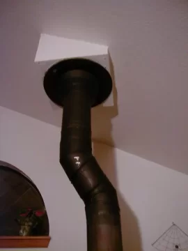 [Hearth.com] Old Stove-wooden thimble clearance?
