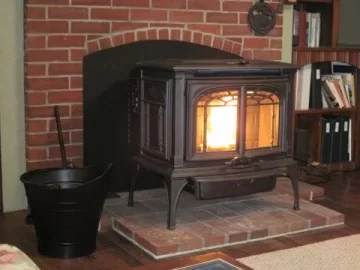[Hearth.com] Pellet Stove in Front of Fireplace