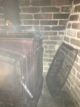 [Hearth.com] Sealed unit? - Smoke coming out of side (Explorer)