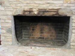 What are pillars either side of firebox?