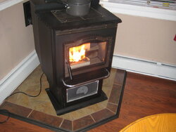 Installing a stand alone pellet stove with a few questions.