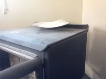 [Hearth.com] when the door is open the smoke comes out