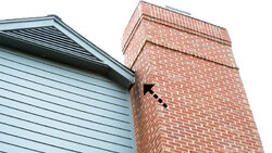 wood (fascia/soffit) immediately next to chimney wall is rot out
