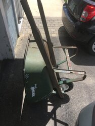 This old wheelbarrow with a bad non standard wheel - using a pellet stove auger set collar to fix!