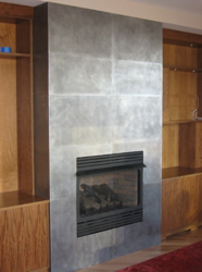 How to apply sheet metal on wall surrounding fireplace???