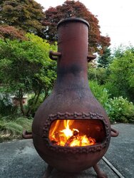 cast iron wood stove outside - prevent rust/waterproof