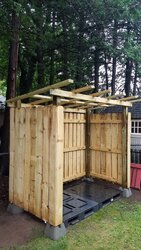 Wood shed built using board on board fencing