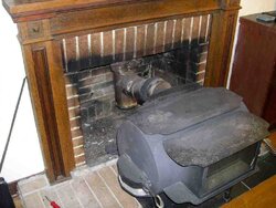 Can an older wood stove be made safer for indoor air quality?