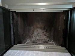 Installing wood stove in old heatilator fireplace.