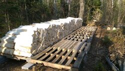 Stacking wood on uneven ground