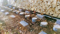 Stacking wood on uneven ground