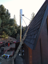 Bracing a tall chimney to roof